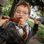 Avery eats his first turkey leg. Photo by Flash