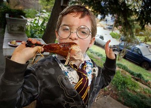 Avery eats his first turkey leg. Photo by Flash